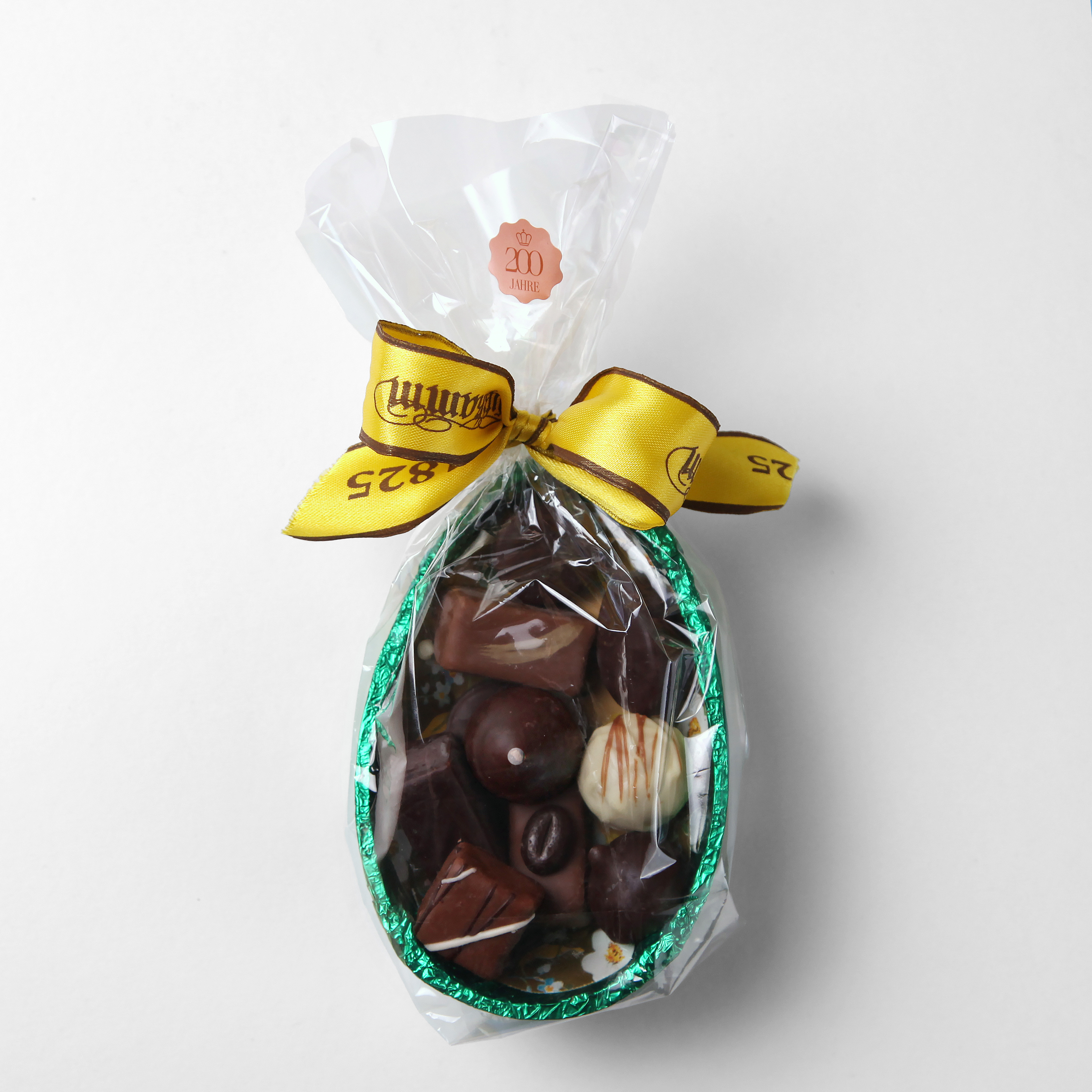 Halbes Schokoladen-Ei mit Pralinen gefüllt 150 g
